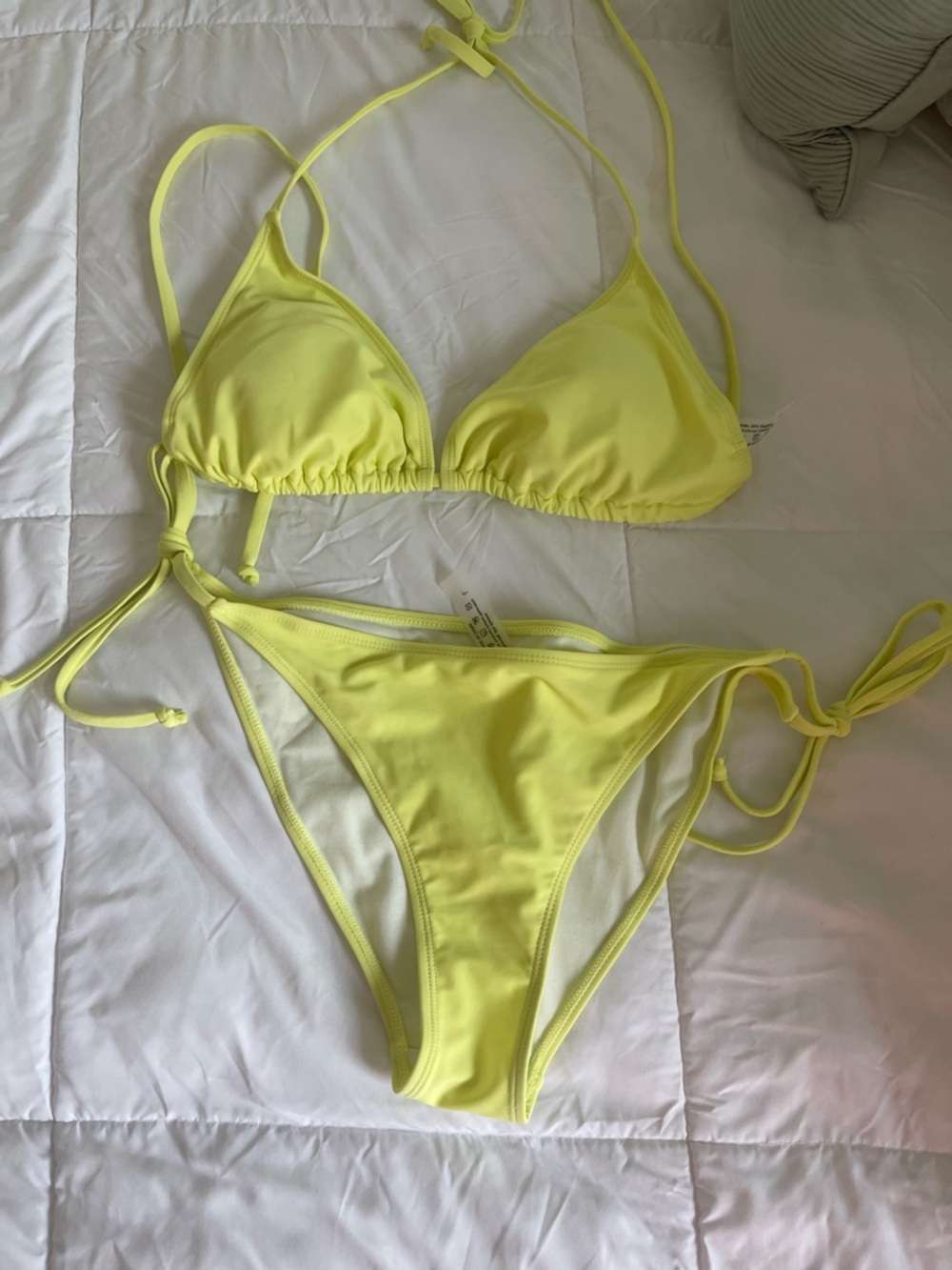 Neon Yellow Triangle String Bikini Set. Runs small.  Never wore